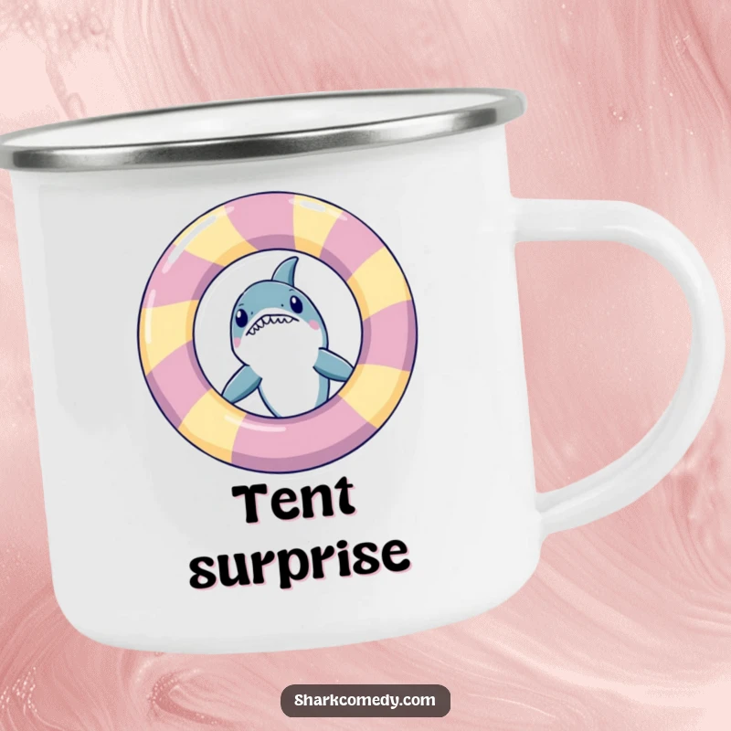 Funny shark peeking from behind an inflatable ring, depicted on a durable camping mug, adding humor to outdoor beverages.