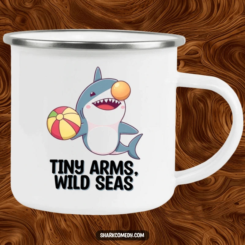 Funny camping mug: a shark with tiny arms precariously balancing a beach ball on its nose. Durable and humorous for adventures.