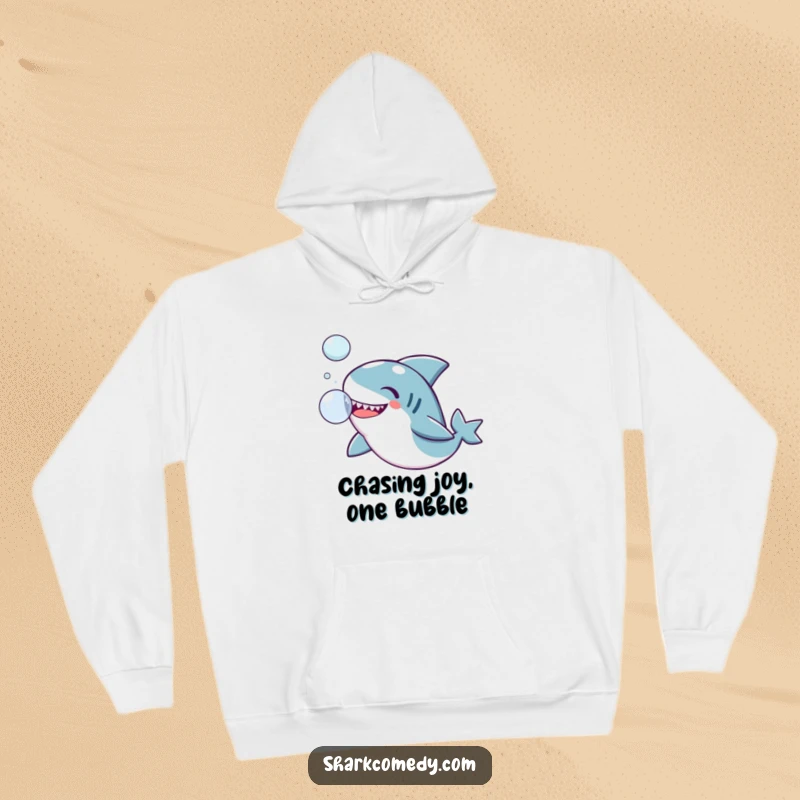 Funny Kawaii shark hoodie, a cute shark gently playing with a large, floating bubble, radiating calm happiness.