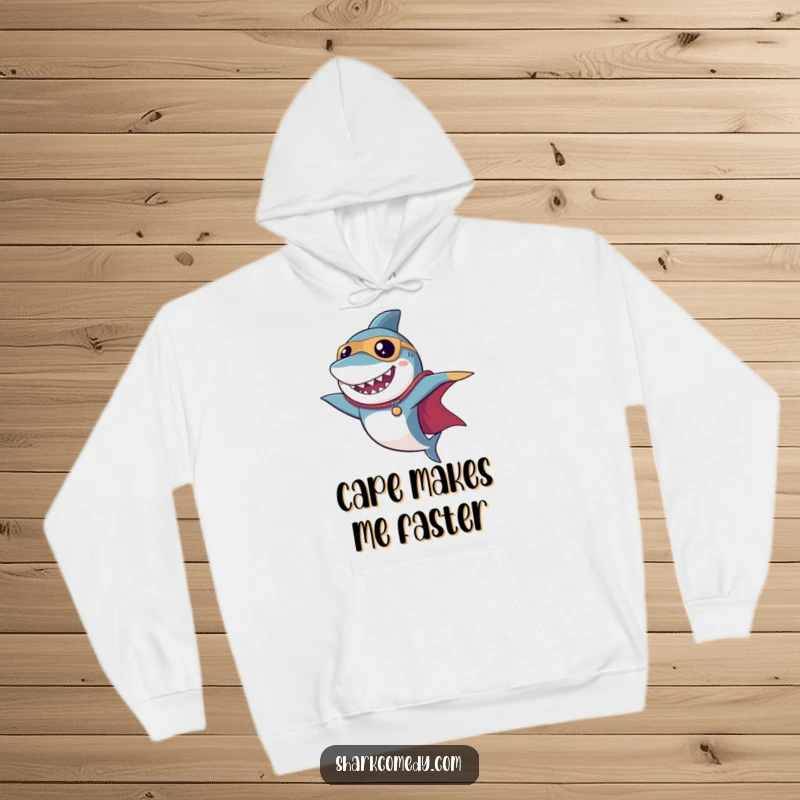 Funny superhero shark hoodie with a dramatic cape pose, offering warmth and a powerful, humorous statement.