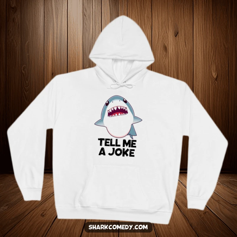 Funny hoodie featuring a shark opening its mouth wide as if telling a joke, displaying its tiny teeth. Comfortable and humorous.