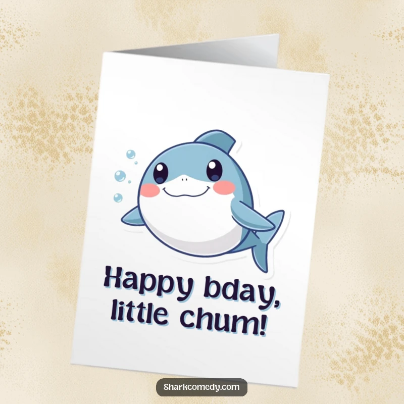 Funny Free Printable Birthday Card: A cheerful round shark with wide, excited eyes swimming excitedly, leaving a bubbly trail, print at home.