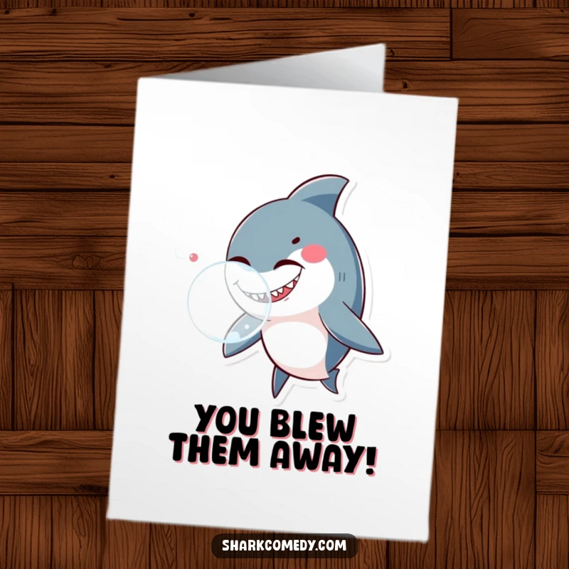 Funny Free Printable Congratulations Card showing a shark winking playfully while blowing an enormous, translucent bubble.