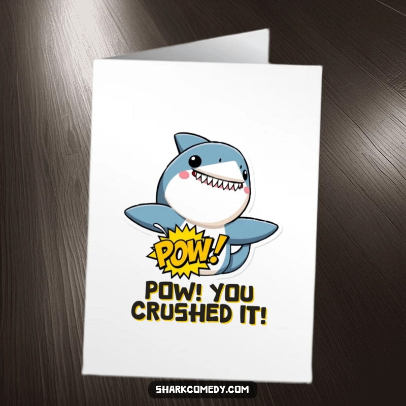 Funny Free Printable Congratulations Card: A shark character excitedly holding a speech bubble proclaiming POW! Perfect for celebrating big wins.