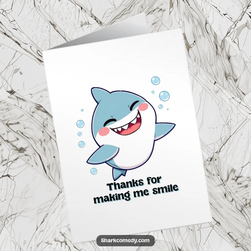 Funny free printable thank you card: A kawaii shark winking playfully while chasing bubbles, expressing thanks.