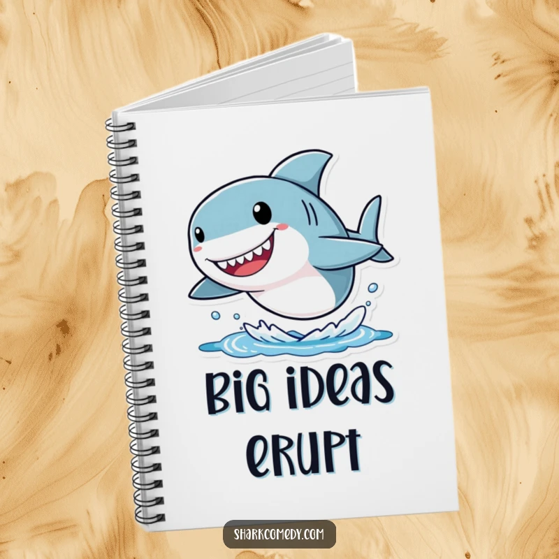 Funny shark notebook featuring a small character with an oversized head, joyfully leaping out of the water, perfect for writing and sketching big ideas.