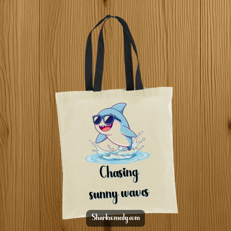 Funny tiny shark tote bag featuring a shark in sunglasses leaping from a water splash, perfect for shopping and humorous gifting.